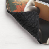 Cat is reading a book on sofa muismat (Hoek)