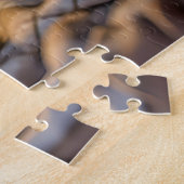 Cat lounging on couch with blanket and lamp legpuzzel (Zijkant)