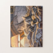Cat lounging on couch with blanket and lamp legpuzzel (Verticaal)