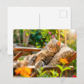 Cat sleeping in garden chair among flowers feestdagenkaart (Voorkant / Achterkant)
