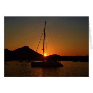 Catamaran bij zonsondergang Ibiza.
