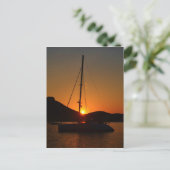 Catamaran op zonsondergang Ibiza. Briefkaart (Staand voorkant)