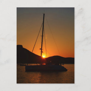 Catamaran op zonsondergang Ibiza. Briefkaart