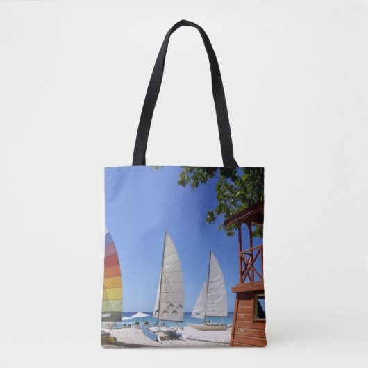 Catamaranen en reddingsboten op strand tote bag (Voorkant)