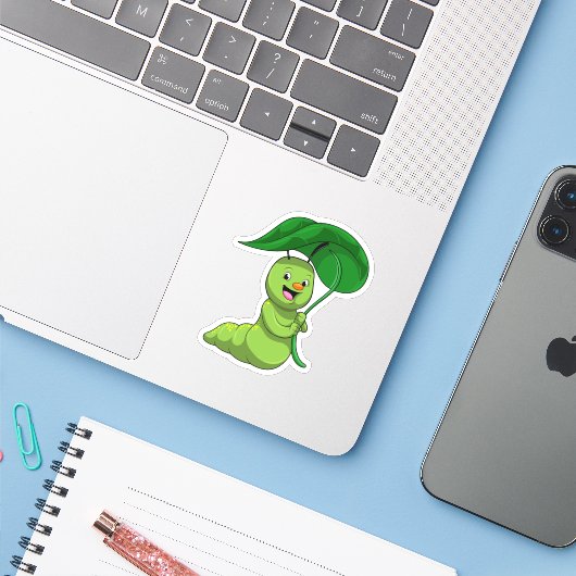 Caterpilaar met leder als parasol sticker (Laptop met iPhone)