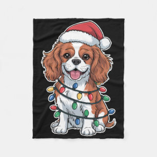 Cavalier King Charles Spaniel gewikkeld in Kerstmi Fleece Deken
