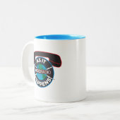 CBC zoals het gebeurt Tweekleurige Koffiemok (Voorkant links)