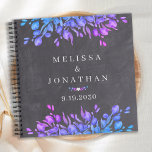 Chalkboard Botanical Paars Blue Wedding Guestbook Notitieboek<br><div class="desc">Nodig gasten uit om goede wensen aan de pasgeborenen in dit aangepaste moderne maar rustige eucalyptustrouwgastenboek te verlaten. Dit grove trouwguestbook is voorzien van elegante botanische groene bladeren, en gepersonaliseerde bruid- en bruinnamen en datums. Bezoek ons eucalyptus bruiloft collectie voor huwelijksuitnodigingen, sla de datums op, en de perfecte huwelijksgunsten voor...</div>