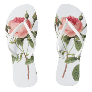 Chanclas blancas de una rosa en cada pie teenslippers