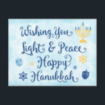 Chanoeka Licht en Vrede Feestdagenkaart<br><div class="desc">Een Joodse Chanoeka-themakaart met een menora, Davidster en Driedel. De tekst luidt Wishing You Light & Peace Happy Chanoeka. De achtergrond is een lichtblauwe waterverf. Personaliseer de achterkant met uw eigen boodschap en / of logo van het bedrijf. Deze briefkaarten zijn een voordelige manier om uw vakantie groeten te sturen...</div>