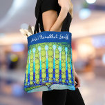 Chanoeka Trendy Blauw Groen Menorah Aangepaste Naa Tote Bag<br><div class="desc">Een close-up foto van een heldere, kleurrijke, blauwe en groene kunstzinnige menorah foto helpt je de vakantie van Chanoeka in stijl in te luiden. Voel de warmte en vreugde van het vakantieseizoen wanneer u deze prachtige, kleurrijke Hanukkah gepersonaliseerde naam canvas tas gebruikt. Overeenkomende kaarten, stickers, dienbladen en andere producten zijn...</div>