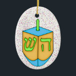 Chanukah Dreidel Keramisch Ornament<br><div class="desc">Veel plezier met deze. Denk aan thema's! Het spel met achtergrondkleuren, voegt of schrapt tekst toe, en (voor een beetje van extra prijs) pas de rug met afbeeldingen, kleur, uw logo/bedrijfsinfo., enz. aan! Deze zijn ook groot voor giften of om als het beëindigen aanraking van klasse op uw gift het...</div>