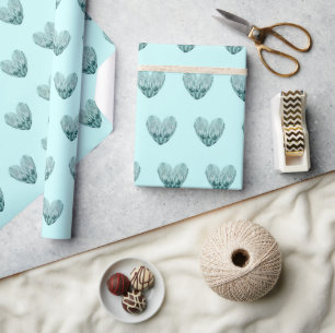 Charmant hartpatroon in mintgroen cadeaupapier