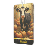 Charmante koe tussen pompoenen op een gouden herfs luchtverfrisser (Links)