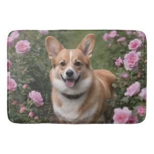 Charmante metgezel: een corgi in een roze rozentui badmat