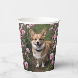 Charmante metgezel: een corgi in een roze rozentui papieren bekers