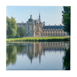 Chateau de Chantilly en reflectie in een vijver Tegeltje
