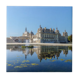 Chateau de Chantilly met reflectie in een vijver Tegeltje