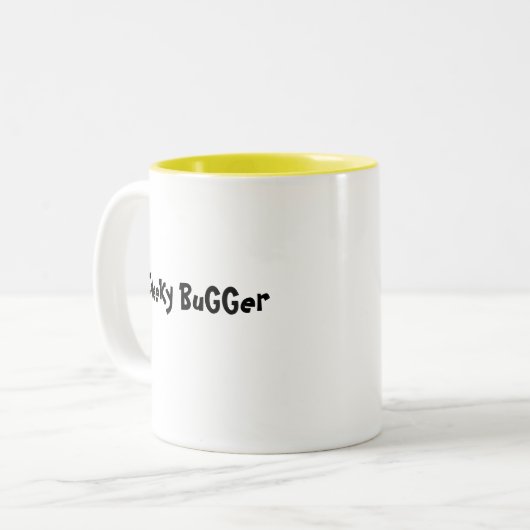 CHeeKy BuGGer Tweekleurige Koffiemok (Voorkant links)