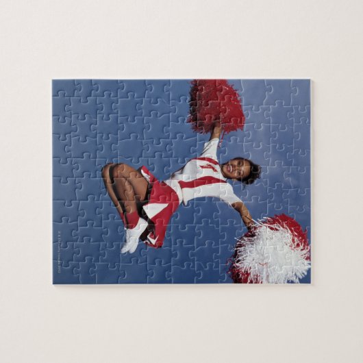 Cheerleader in de lucht legpuzzel (Horizontaal)
