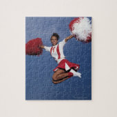 Cheerleader in de lucht legpuzzel (Verticaal)