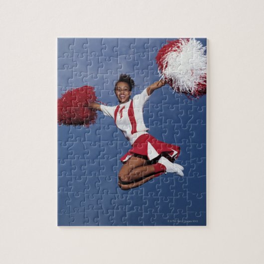 Cheerleader in de lucht legpuzzel (Verticaal)