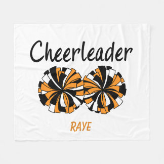 Cheerleader met oranje en zwarte pompons fleece deken