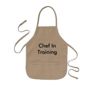 Chef in de opleiding van kinderpron kinder schort