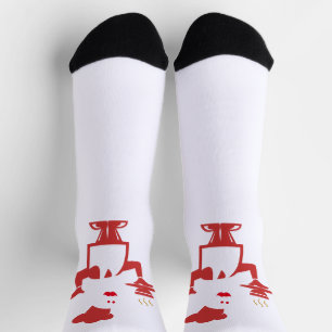 Chef-kok met een kom soep sokken