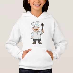 Chef met Chef's pet en soep lepel