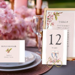 Cherry Blossom Huwelijksreceptie Kaart<br><div class="desc">Cherry Blossom trouwtafel nummer met optionele aangepaste tekst. Een prachtig zacht roze en wit ontwerp, versierd met delicate waterverf kersenbloesem en champagneglazen, die een sierlijk en botanisch gevoel geven aan uw feest. Het ontwerp zet de toon voor een romantische en onvergetelijke dag die de tijdloze schoonheid van de lente belichaamt...</div>
