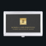 Chic Black Leather Zakelijk Gouden Logo Visitekaarthouder<br><div class="desc">Deze luxueuze visitekaartjes houder heeft een verfijnde zwart-grijslederen textuur, perfect gecombineerd met uw zakelijke logo over een faux gold overlay voor een premium, professionele uitstraling. Jouw naam, beroep of vaste naam onderscheidt zich in weelderige goudkleurige letters, waardoor een tijdloze en onvergetelijke indruk ontstaat. Ideaal voor professionals in verschillende sectoren, waaronder...</div>