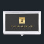 Chic Black Leather Zakelijk Gouden Logo Visitekaarthouder<br><div class="desc">Deze luxueuze visitekaartjes houder heeft een verfijnde zwart-grijslederen textuur, perfect gecombineerd met uw zakelijke logo over een faux gold overlay voor een premium, professionele uitstraling. Jouw naam, beroep of vaste naam onderscheidt zich in weelderige goudkleurige letters, waardoor een tijdloze en onvergetelijke indruk ontstaat. Ideaal voor professionals in verschillende sectoren, waaronder...</div>
