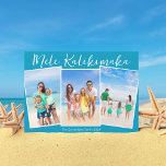 Chic Blauw Mele Kalikimaka 3 Strand Foto Kerstmis Feestdagenkaart<br><div class="desc">Chic blauwe aanpasbare strand familie foto collage kerstkaart met je favoriete tropische foto's in de zon. Voeg 3 van je favoriete verticale fotoherinneringen van je eilandvakantie toe aan de kust. Mooie kust horizontale kerstkaarten met een schone,  moderne foto lay-out en mooi wit schrift.</div>