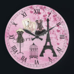 Chic Girly Pink Paris Fashion Clock Grote Klok<br><div class="desc">Whimsical, romantic, classiy pink Paris roman numerals clock with the Eiffel Tower, French magazines, beautiful pink and black corset, maker s model, antique bird cage and hearts on a shabby chic pink vintage look background. An elegant, fun, trendy, glamorous gift for women and challenge girls. Some elements purchased from Suz...</div>