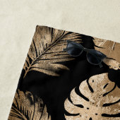 Chic zwart goud tropische bladeren strandlaken (In situ)