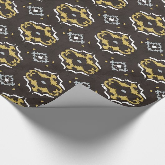 Chinees geelbruin ikattribaal patroon cadeaupapier (Hoek)
