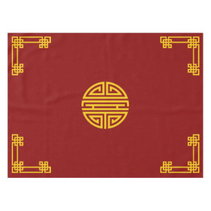 Chinees motief patroon goud op rood tafelkleed