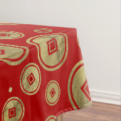 Chinees muntpatroongoud op rood tafelkleed (Voorbeeld)