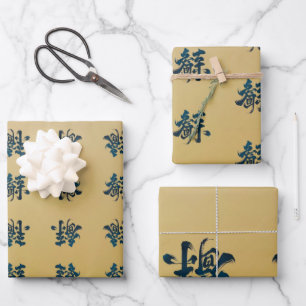 Chinees script ingesteld op goud inpakpapier vel