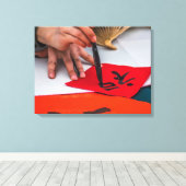 Chinese kalligrafie demonstratie canvas print (Insitu (Houten vloer))