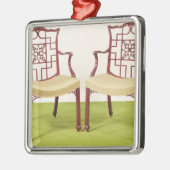 Chippendale mahogany eetstoelen metalen ornament (Links)