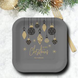 Chique kerstversiering op grijs papieren bordje