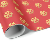 Chique nepsneeuwvlokken van goud op rood cadeaupapier (Rol Hoek)