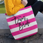 Chique roze en witte strepen zwart team bruid tote bag<br><div class="desc">All-Over-Print Tas met de woorden "Team Bride" in zwart trendy script tegen een roze en witte strepen patroonachtergrond. Perfect voor bruiloften voor bruidsmeisjes, bruidsmeisje en bloemenmeisje. Zie voor andere overeenkomende items hier https://www.zazzle.com/collections/119250194970828530?rf=238364477188679314 Personaliseer het door de tekst voor de plaatsaanduiding te vervangen. Voor meer opties, zoals het wijzigen van het...</div>