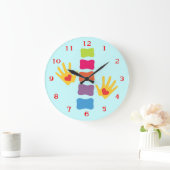 Chiropraktische handen en een ruggengraat van de L Grote Klok (Huis)