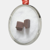 Chocolade met suiker als achtergrond metalen ornament (Links)