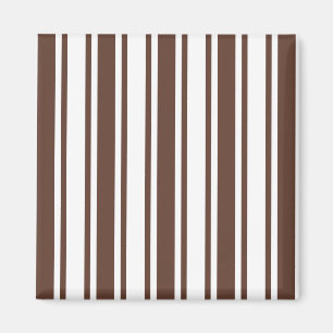Chocoladebruine en witte snoepjes strepen magneet