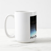 Chocoladepommerse puppy op mok (Links)