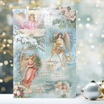 Choir of Vintage Winter Angels Collage Feestdagen Kaart<br><div class="desc">Een prachtige collage van mooie Victoriaans engelen,  sneeuwdepiene,  rozen,  heilige kerstmuziek,  typografie,  evergroenen en rustige landschappen op het platteland die zijn omgeven door een delicaat witte filigree op een lichthemelblauwe achtergrond.</div>